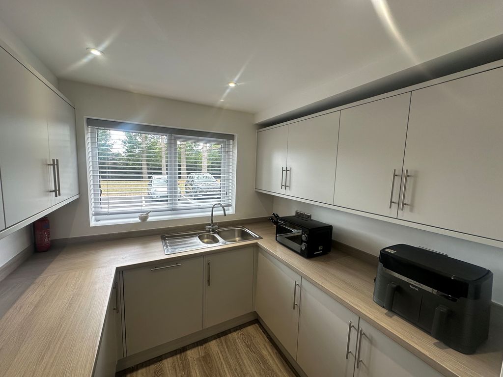 Property photo 3 of 11 Kitchen