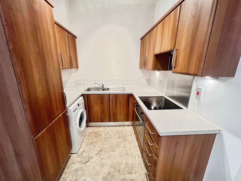 Property photo 2 of 13 Kitchen