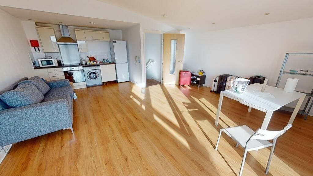 Property photo 2 of 5 A Bright And Spacious Living Area Featuring Ample ...