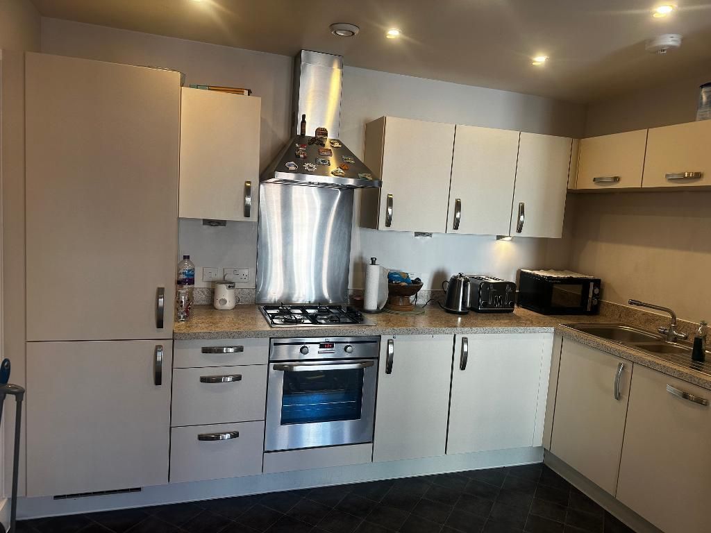 Property photo 3 of 11 Kitchen Area