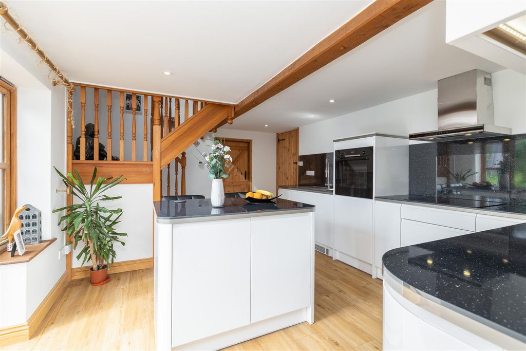 Property photo 3 of 34 Upgraded Kitchen