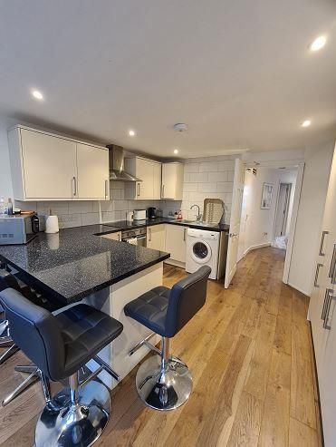 Property photo 3 of 8 Kitchen