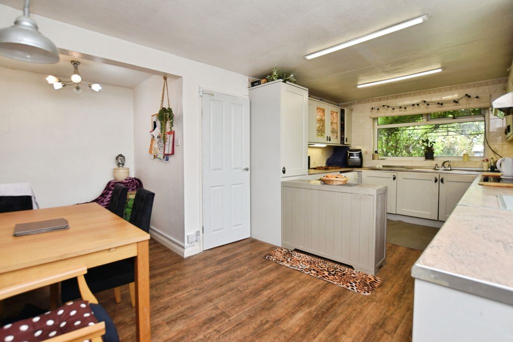 Property photo 2 of 13 Dining Kitchen