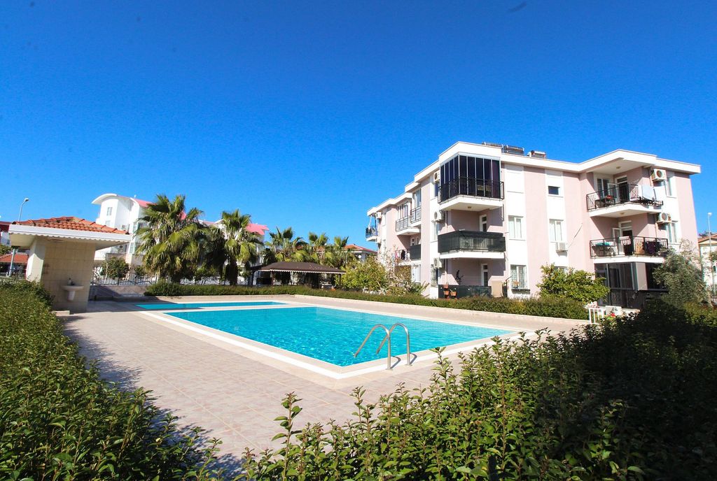 Property photo 1 of 21 Centrally Located Apartment In Belek, Antalya For Sale - Main View Of The Property And Communal Pool