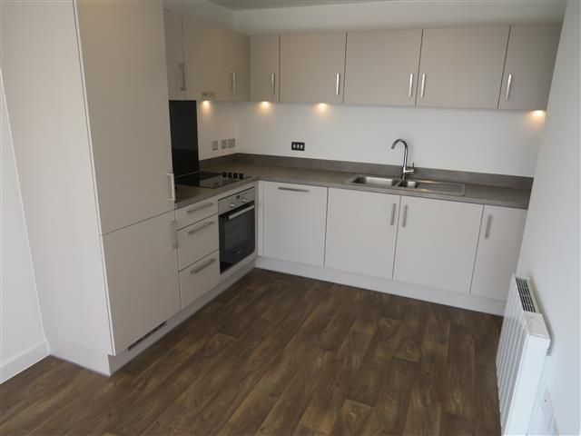 Property photo 3 of 8 Kitchen