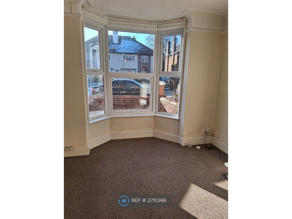 Property photo 3 of 12 Front Lounge