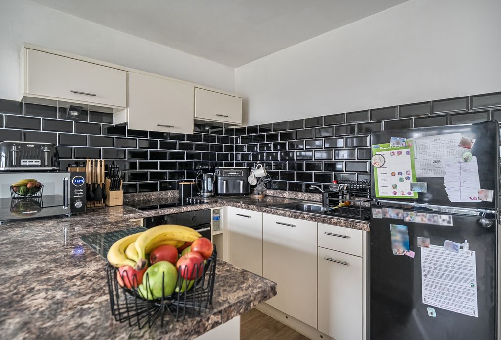 Property photo 1 of 9 Kitchen Area