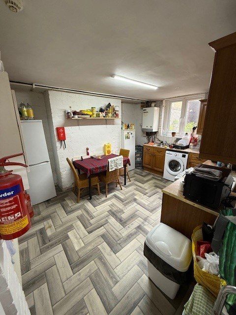 Property photo 3 of 23 Basement Kitchen