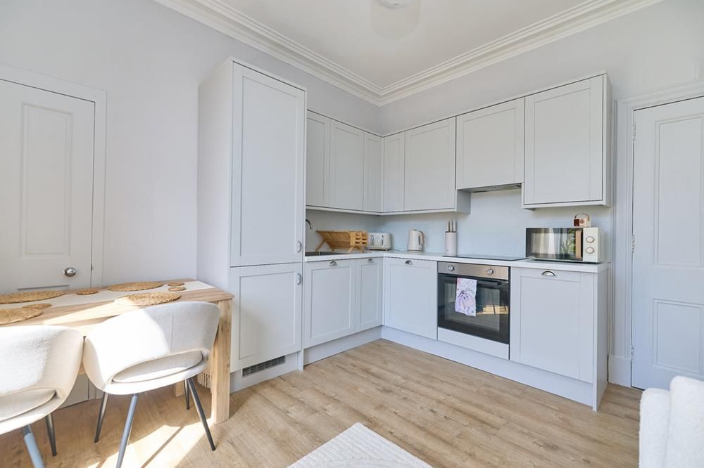 Property photo 2 of 10 Allan−Living Rm Kitchen3