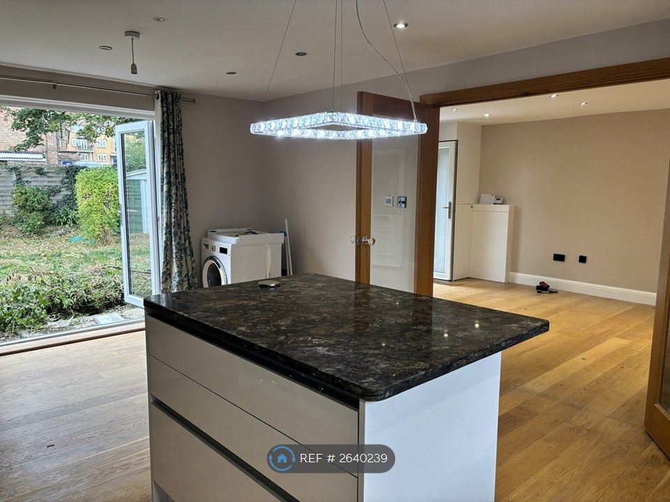 Property photo 2 of 35 Dining Room View From Kitchen Island