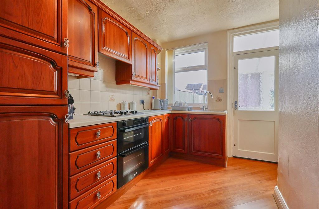Property photo 3 of 10 Fitted Kitchen To Rear