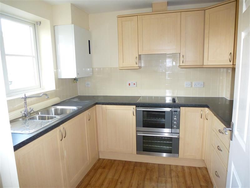 Property photo 2 of 8 Kitchen