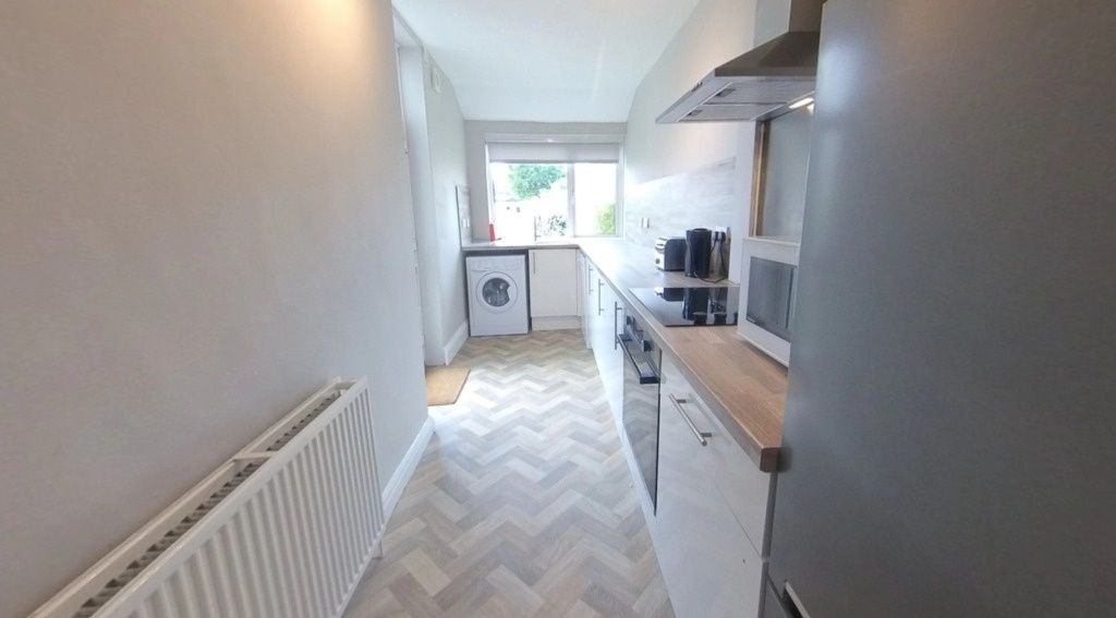 Property photo 2 of 12 Bright, Modern Galley Kitchen With Fitted Units, W...