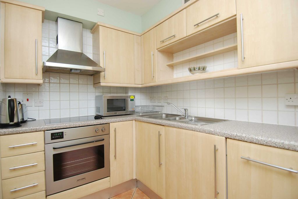 Property photo 3 of 8 Kitchen