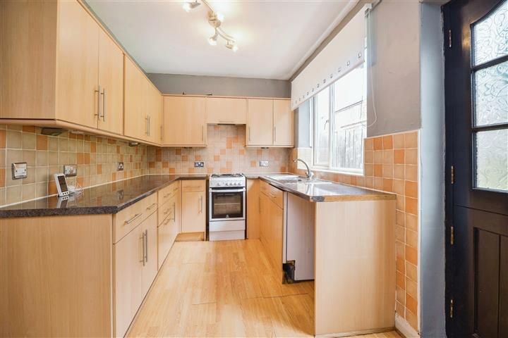 Property photo 3 of 12 Kitchen