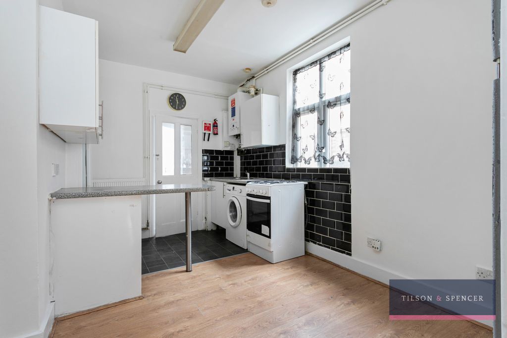 Property photo 2 of 12 Kitchen Dining Area