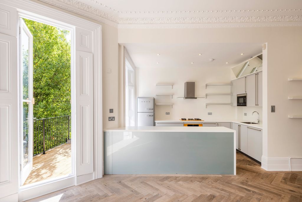 Property photo 3 of 9 Kitchen And Terrace