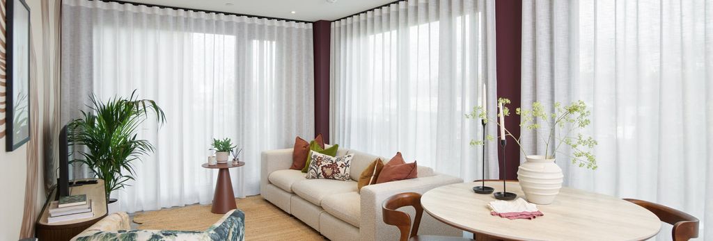 Property photo 1 of 5 Living Space With Curtain Blinds Wrapped Around Corner, Dining Table In Adjacent.