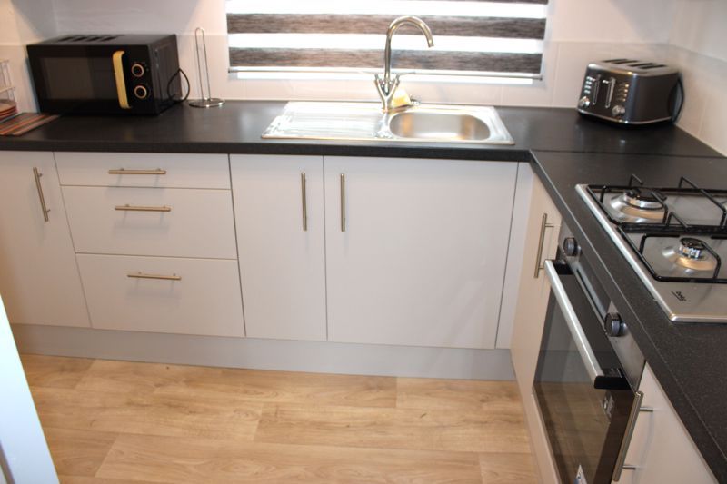 Property photo 2 of 12 Kitchen