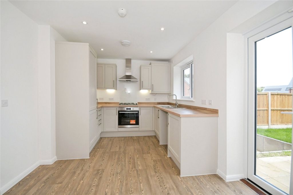Property photo 3 of 9 Typical Kitchen
