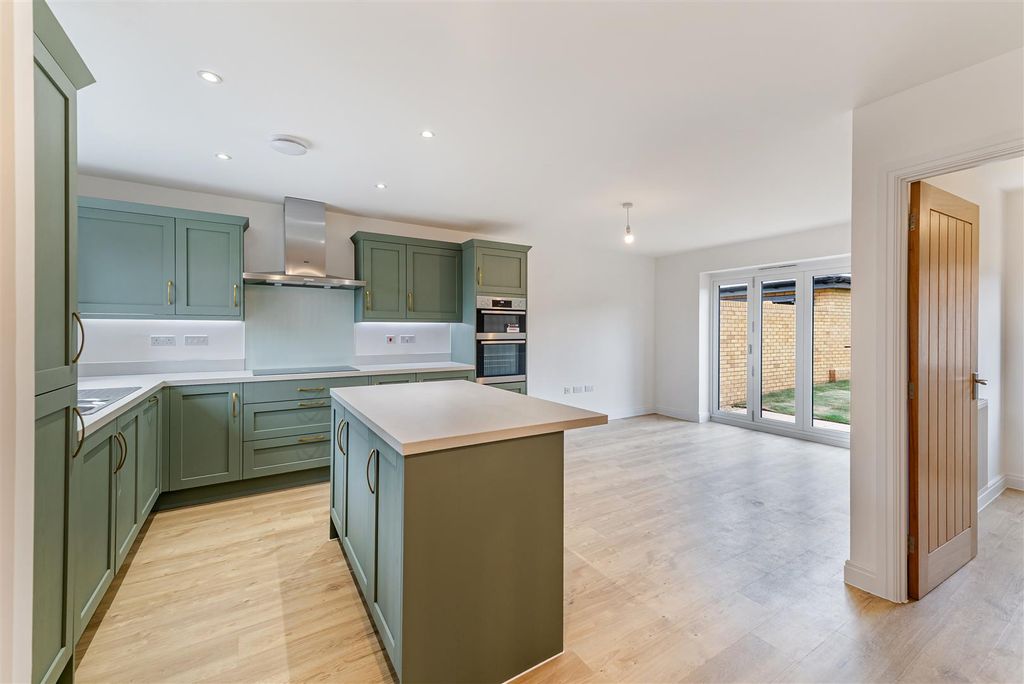 Property photo 3 of 21 Kitchen/Dining/Family