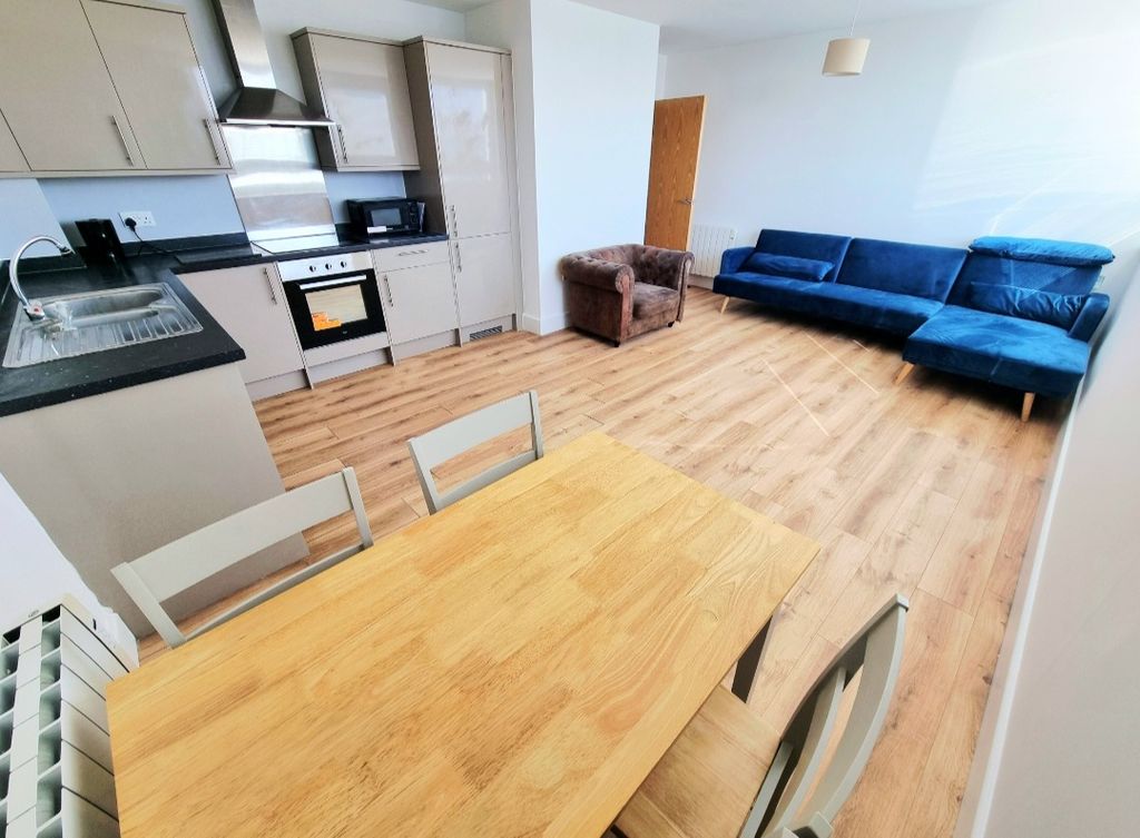 Property photo 1 of 6 Living Area