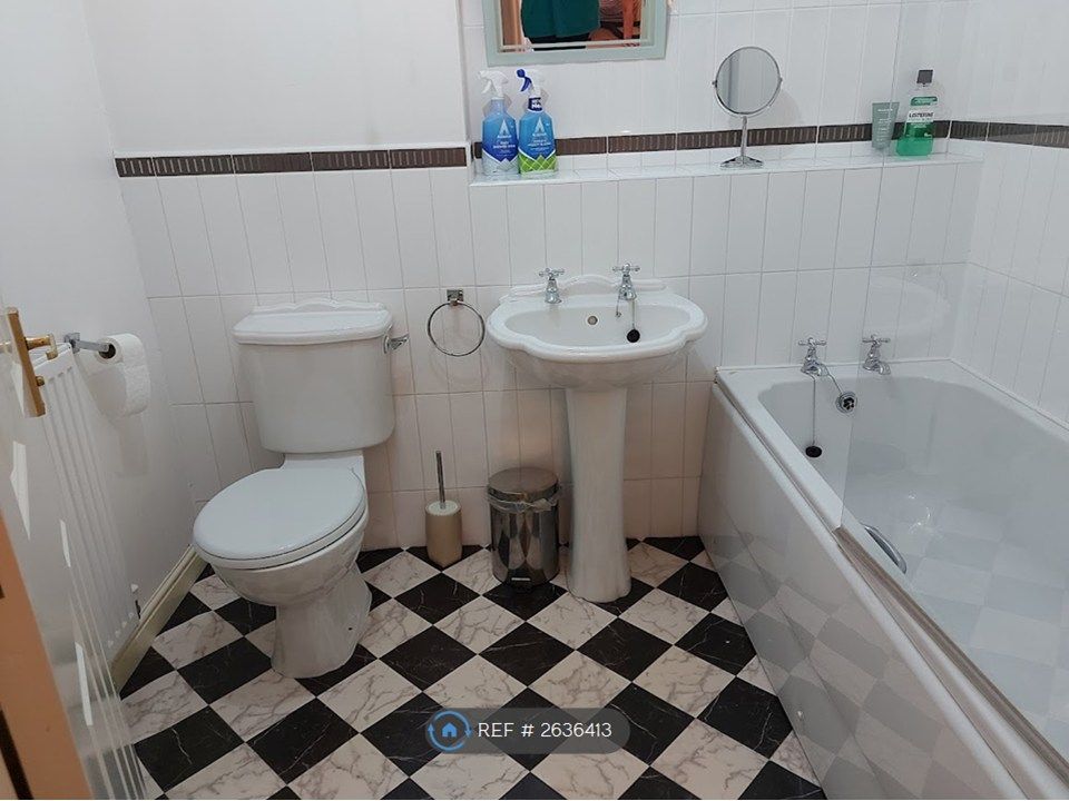 Property photo 2 of 12 Fully Tiled Bathroom With Shower And Bath Tub