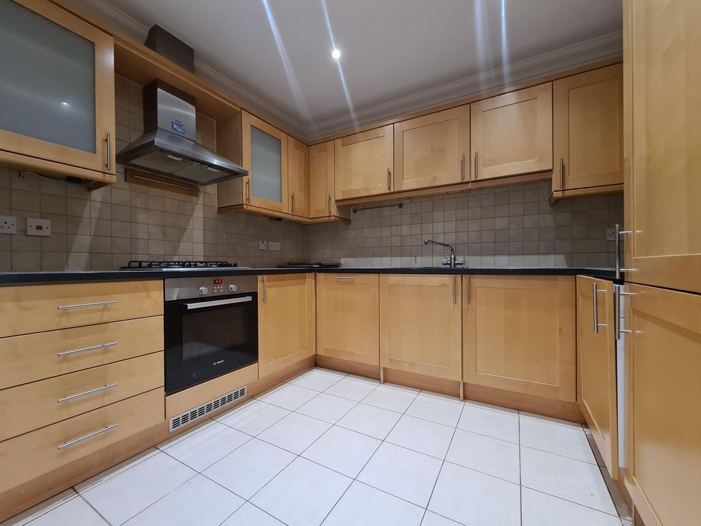 Property photo 3 of 12 Kitchen