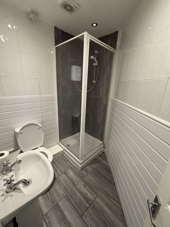 Property photo 2 of 19 A Modern, Clean Bathroom Featuring A Spacious Show...
