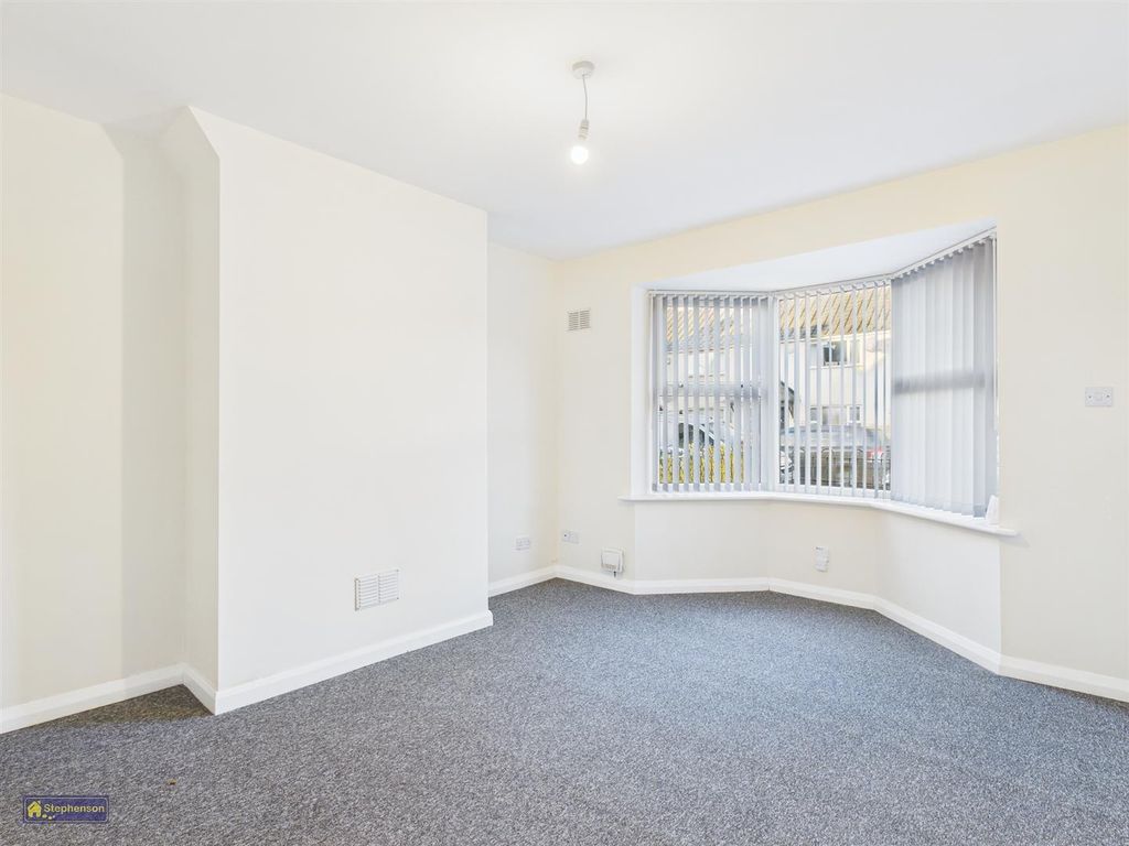 Property photo 2 of 8 Living Room