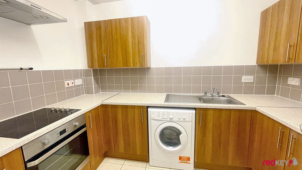 Property photo 3 of 6 Kitchen