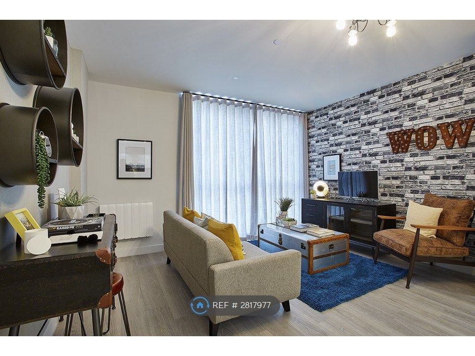 Property photo 3 of 12 Living Area