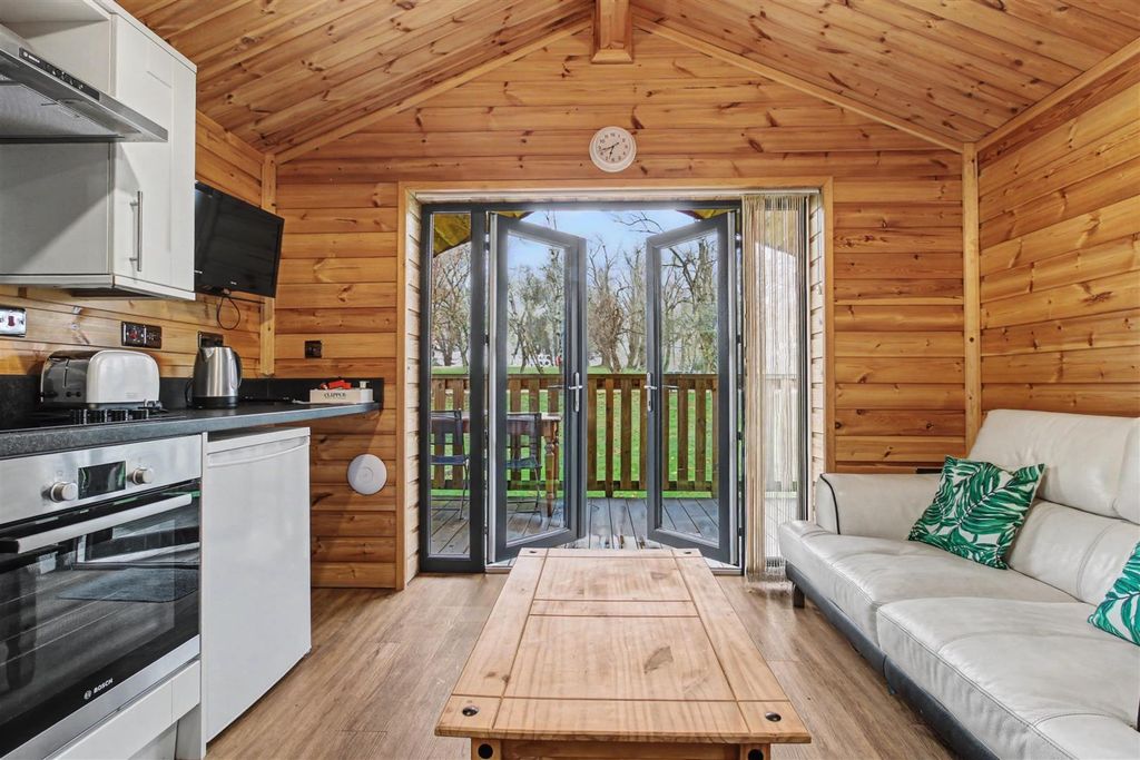 Property photo 3 of 14 Kitchen Living