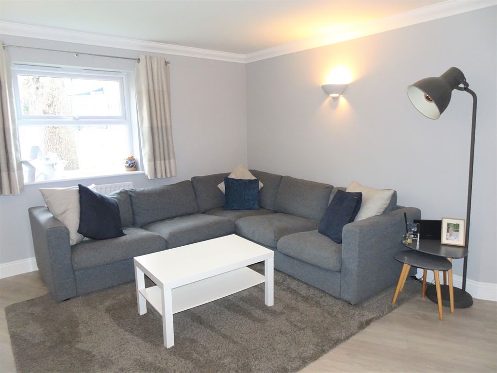 Property photo 2 of 12 Living Area