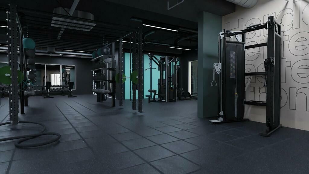 Property photo 3 of 12 A Spacious And Modern Gym With Well-Maintained Equ...