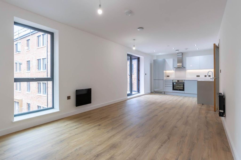 Property photo 1 of 18 Living Area