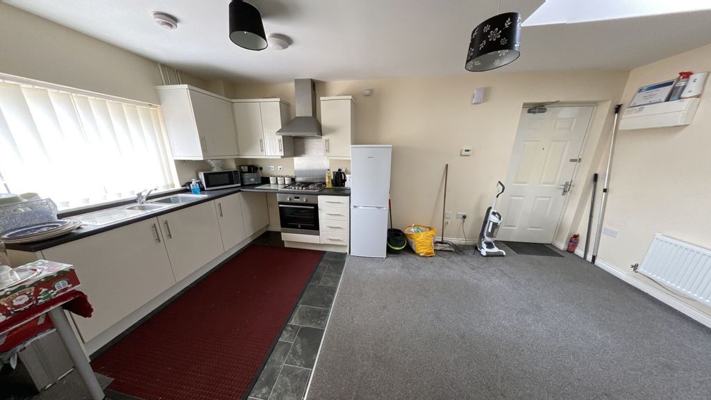 Property photo 2 of 5 Kitchen And Living Room