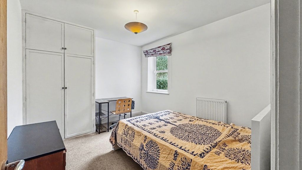 Property photo 2 of 8 Bright Bedroom With Desk And Built-In Storage...