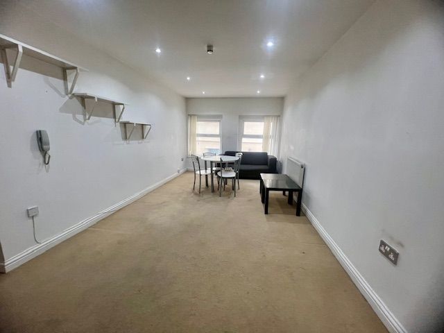 Property photo 2 of 8 Living Room