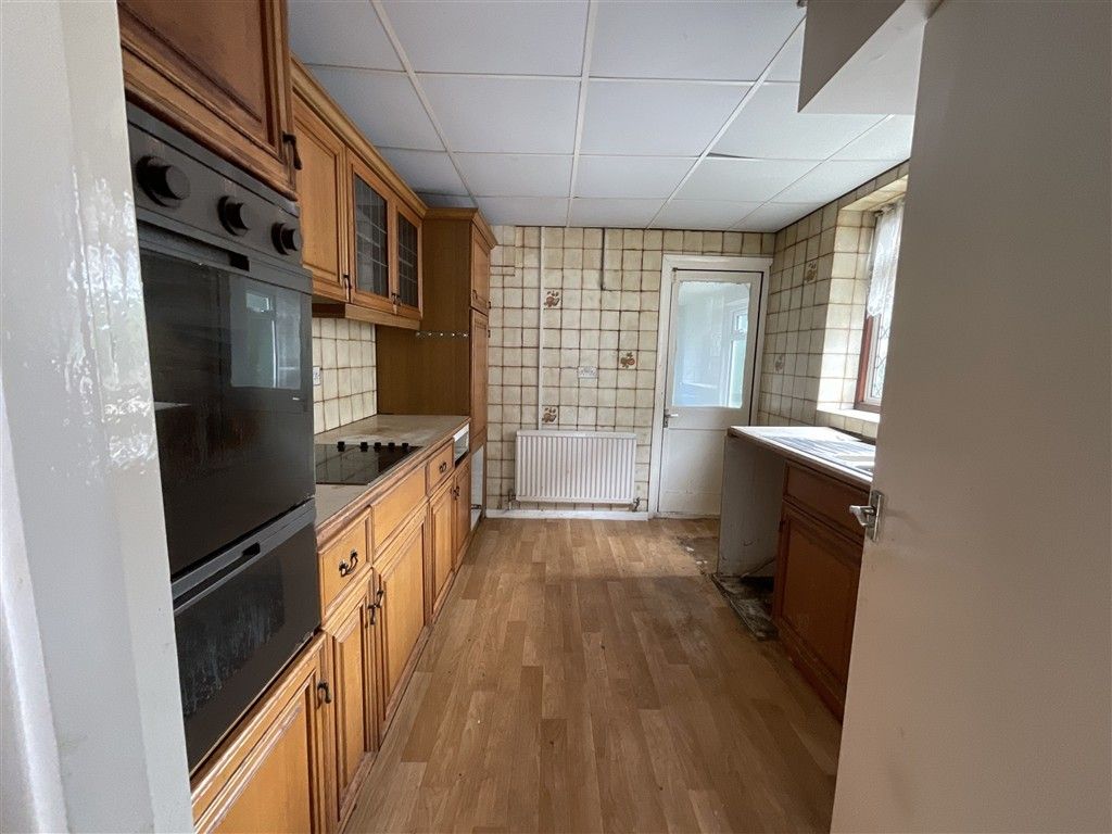 Property photo 3 of 7 Kitchen