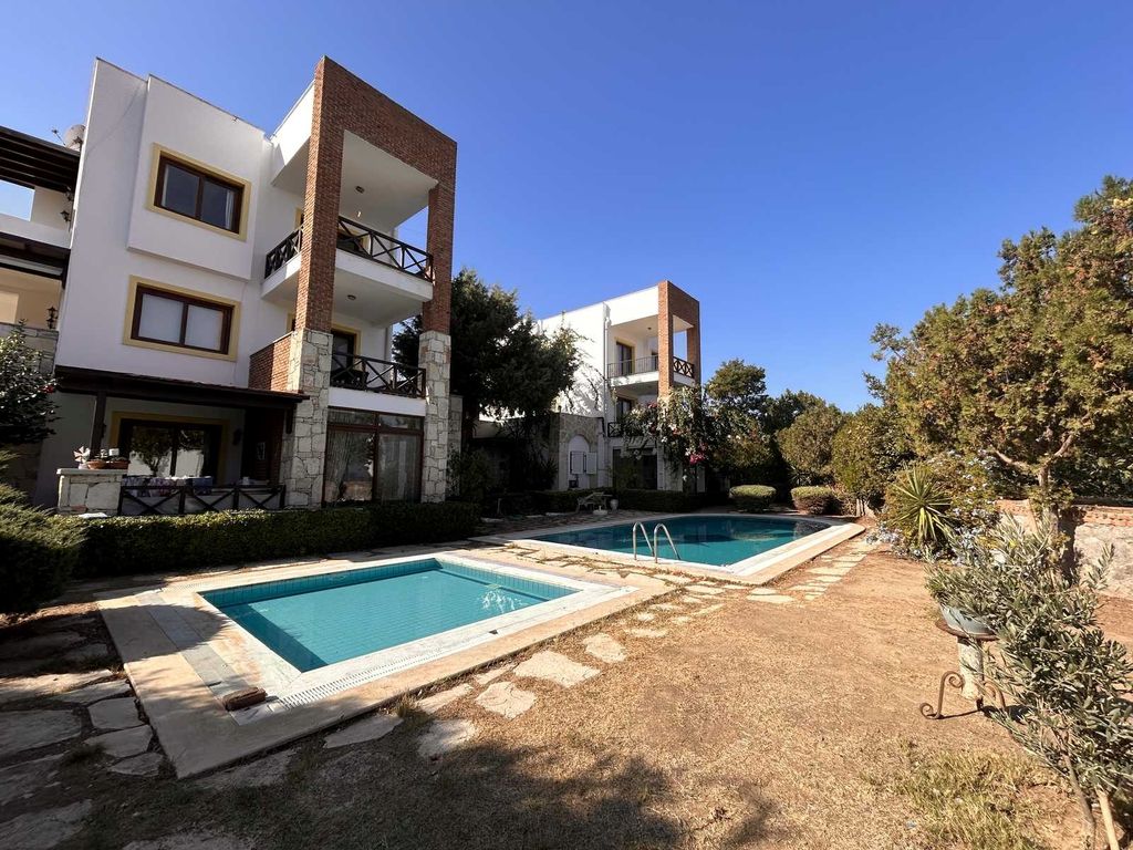 Property photo 1 of 22 A Beautiful Furnished Apartment In Bodrum For Sale - Communal Pool And Gardens