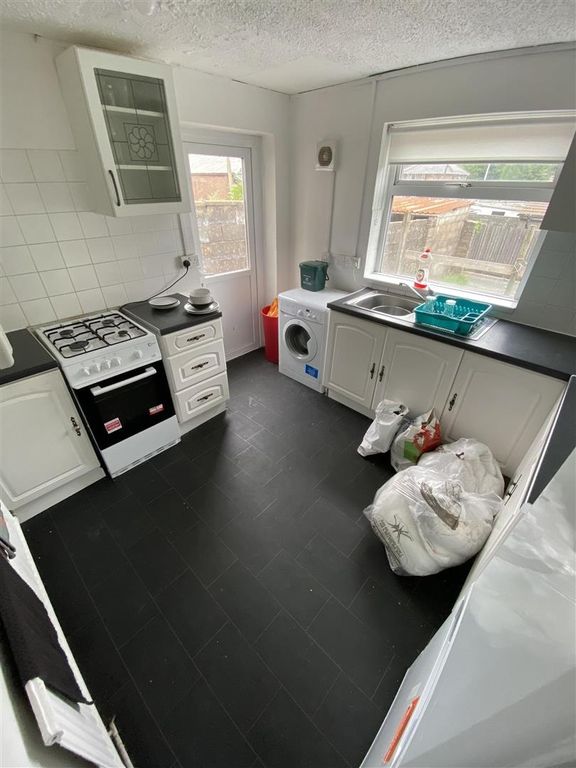Property photo 2 of 10 Bright Kitchen With Modern Dark Flooring...