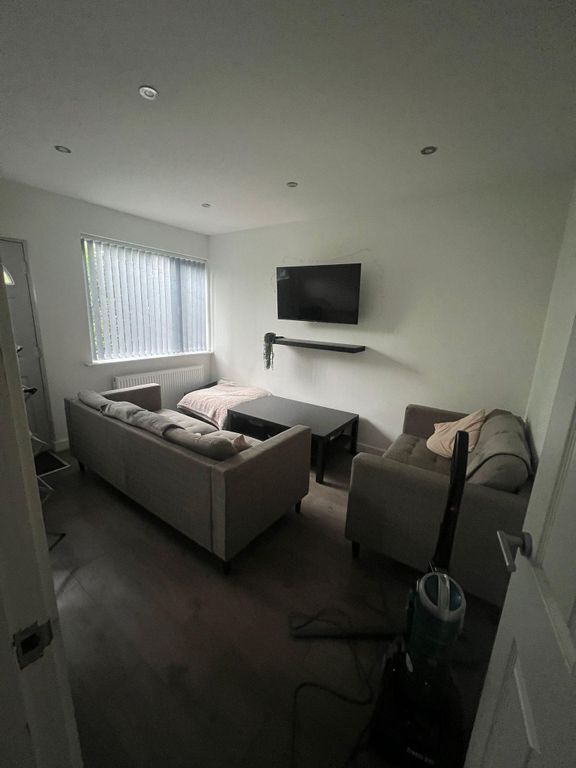 Property photo 2 of 7 Contemporary Living Room With A Wall-Mounted TV, T...