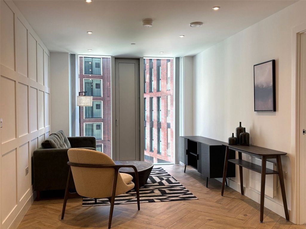 Property photo 1 of 12 Living Area