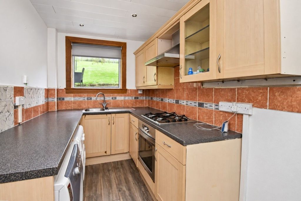 Property photo 3 of 9 Kitchen