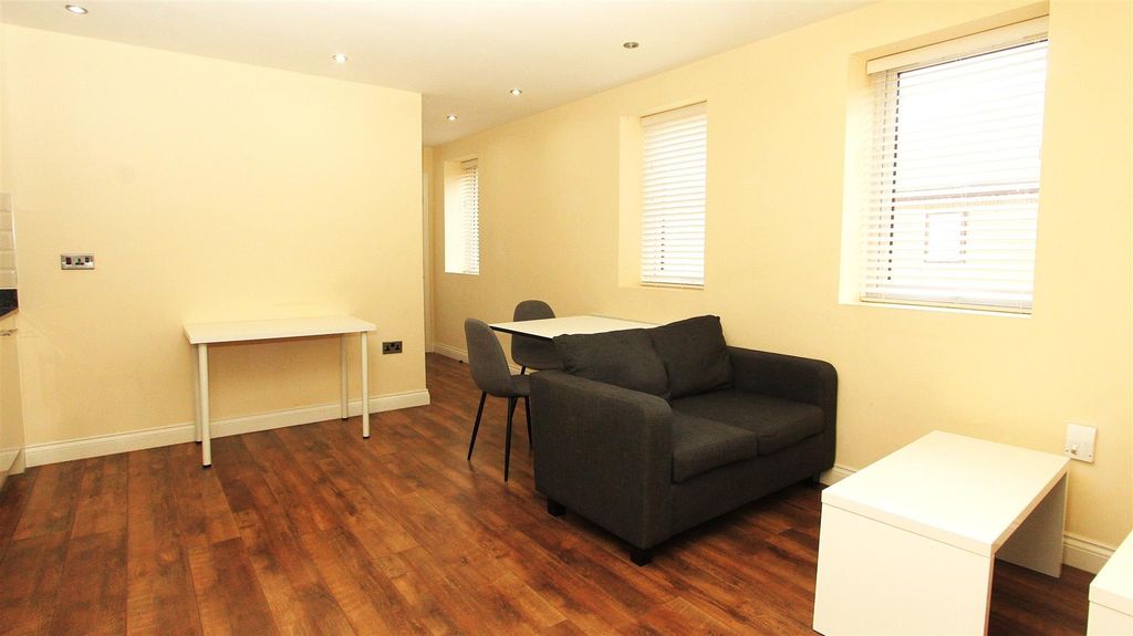 Property photo 2 of 6 Bright Lounge With Sleek Wooden Flooring...