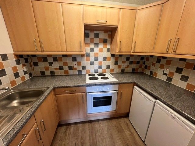 Property photo 3 of 7 Kitchen