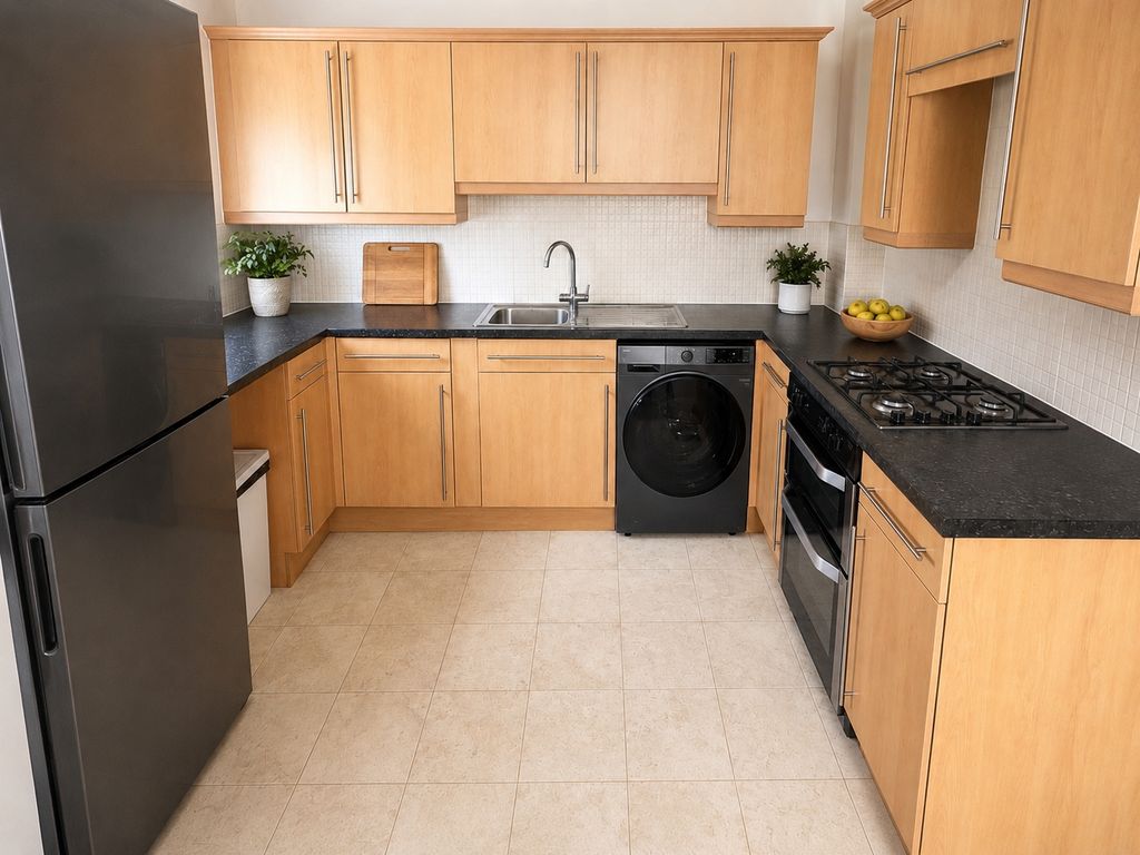 Property photo 3 of 6 Kitchen