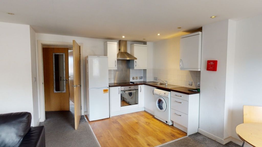 Property photo 3 of 5 Modern Kitchen Area With White Cabinetry, Integrat...