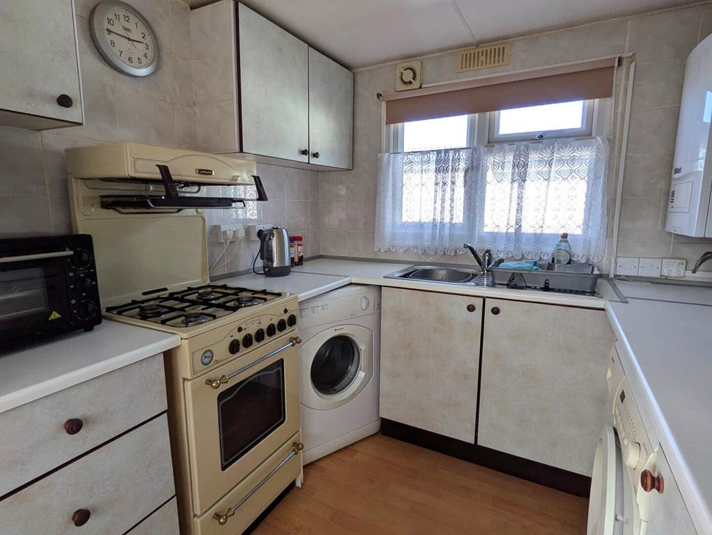 Property photo 3 of 16 Kitchen